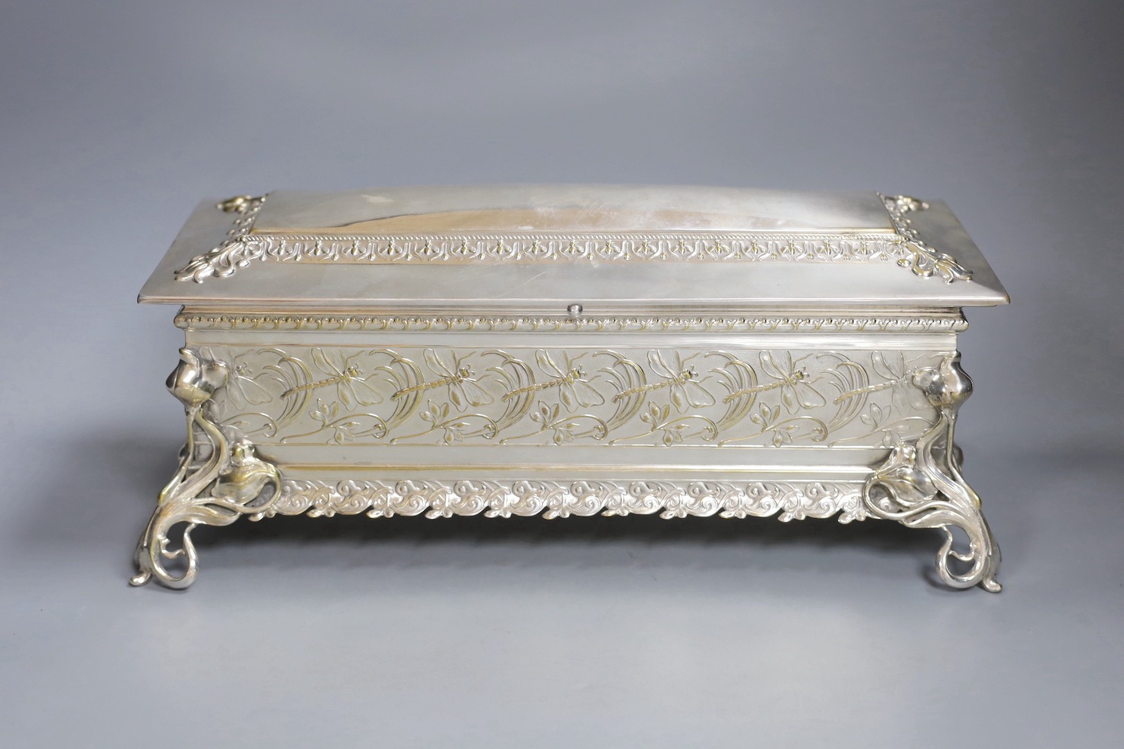 Large WMF plated presentation box, with pleated and buttoned turquoise satin interior, 39 cms wide x 15.5 cms high.